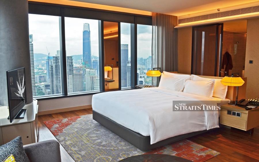 EQ's premier king rooms are very well appointed with commanding views of the KL skyline.