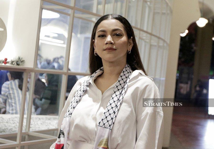 Singer Kaka Azraff demands that Warner Music Malaysia gives her the concrete reason behind the sudden contract termination notice served recently.- NSTP/SADIQ SANI