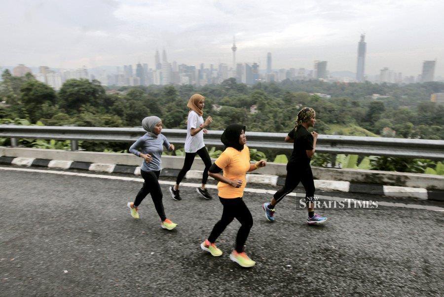 This file pic dated June 18, 2020, shows members of the public jogging in Bukit Tunku. - NSTP/EFFENDY RASHID