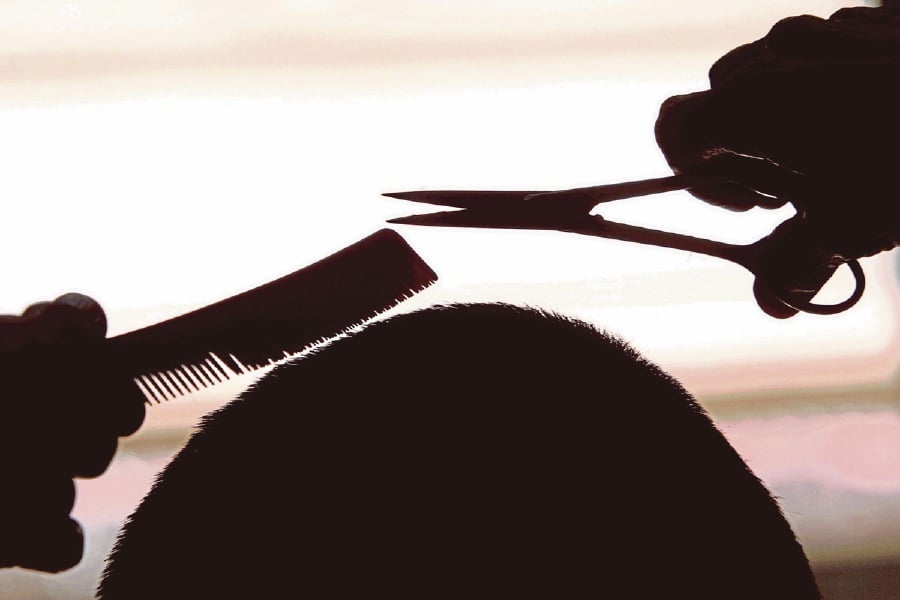 The incident of a father losing his temper in front of a school due to his son’s hair being cut without permission could have been averted with better communication between teachers and parents. - NSTP filepic