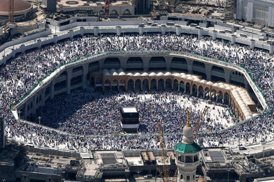An aerial view shows Makkah's Grand Mosque with the Kaabah, Islam's holiest site in the centre. -- AFP Filepic