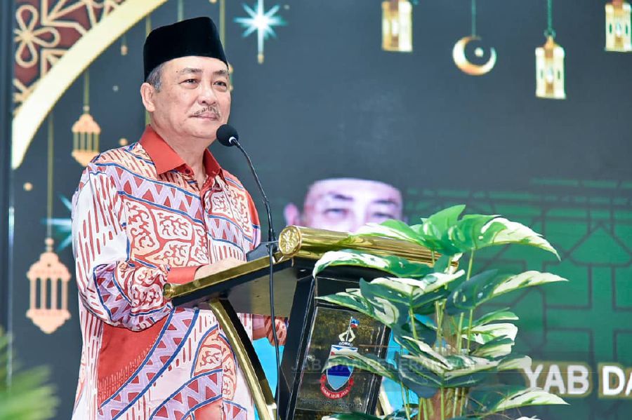 Sabah Chief Minister Datuk Seri Hajiji Noor speaking during the Iftar event jointly organised by the State Ministry of Community Development and People's Well-being and the Paitan Small District Office at the Paitan Community Hall. Photo courtesy of Sabah Information Department. - Pic courtesy of Sabah Information department