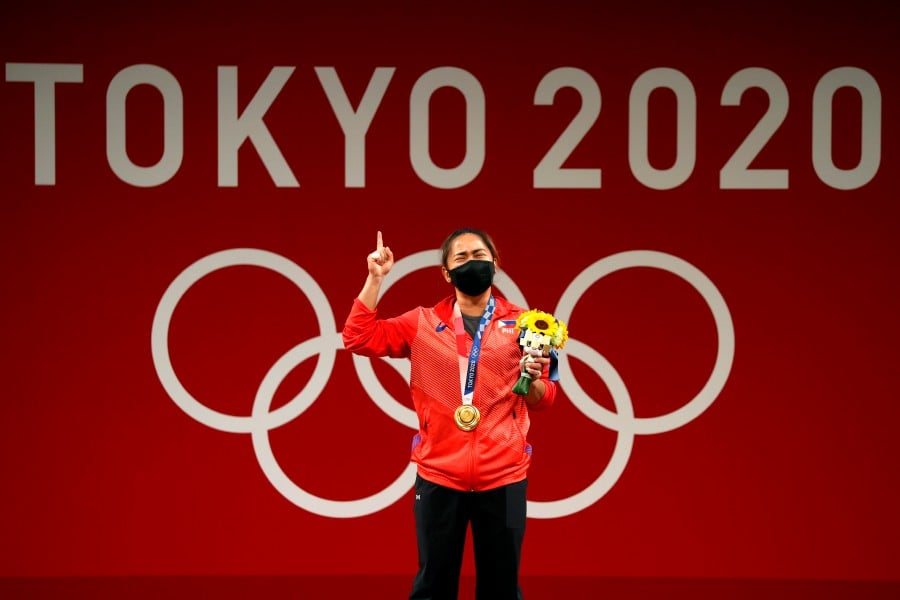 Weightlifter Diaz wins first ever Olympic gold for Philippines New