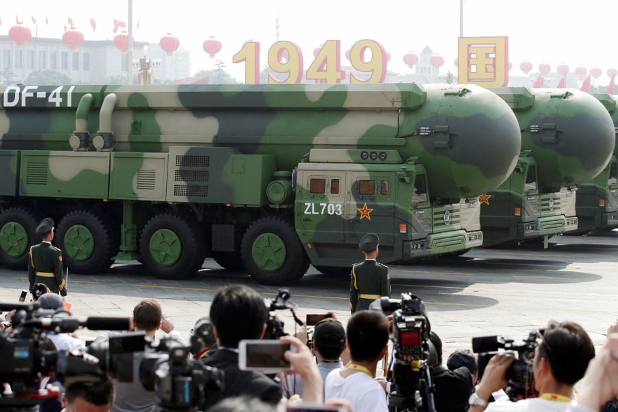 FILE PHOTO: Military vehicles carrying DF-41 intercontinental ballistic missiles travel past Tiananmen Square during the military parade. -  Australia voiced concern at China's firing of an intercontinental ballistic missile that splashed down in the South Pacific on Wednesday, its first such test in decades. Reuters file pic