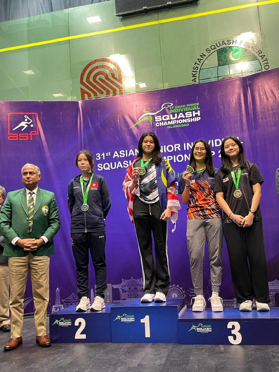 Malaysia's Harleein Tan (centre) on the podium with other medallists after winning the girls’ Under-15 title at the Asian Junior Squash Championships in Islamabad, Pakistan, on Saturday. PIC FROM SRAM 