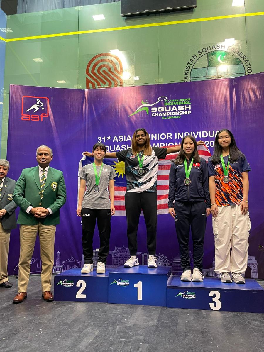 Malaysia's U. Thanussa (centre) on the podium with other medallists after winning the girls’ Under-19 title at the Asian Junior Squash Championships in Islamabad, Pakistan, on Saturday. PIC FROM SRAM 