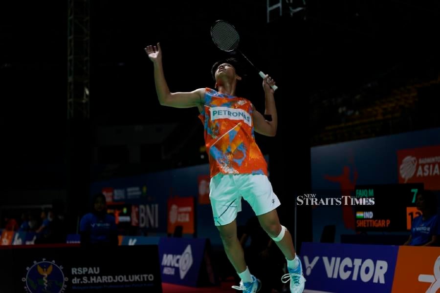 Malaysia’s Faiq Masawi in action during the mixed team event at the Asia Junior Championships in Yogyakarta recently. PIC FROM BAM 