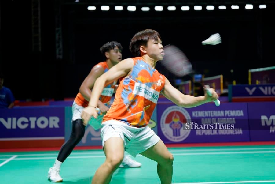 Kang Khai Xing-Aaron Tai (right) in action against India during Monday’s mixed team quarter-finals at the Badminton Asia Junior Championships in Yogyakarta, Indonesia. PIC FROM BA OF MALAYSIA 