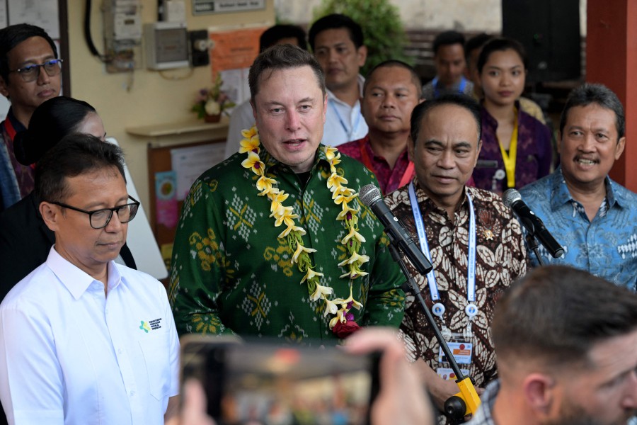 Tech billionaire Elon Musk (2nd L) speaks next to Indonesia's Health Minister Budi Gunadi Sadikin (L) during a ceremony held to inaugurate satellite unit Starlink at a community health center in Denpasar on Indonesia's resort island of Bali on May 19, 2024. Musk launched on May 19 his Starlink service on Indonesia's resort island of Bali as the country aims to extend internet to its remote areas. Millions of people in Indonesia, a vast archipelago of more than 17,000 islands, are not currently hooked up to reliable internet services. - AFP pic