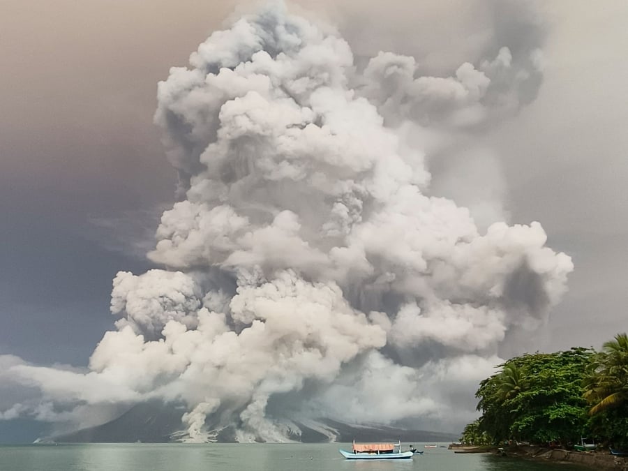 An eruption from Mount Ruang volcano is seen from Tagulandang island in Sitaro, North Sulawesi. (Photo by AFP)