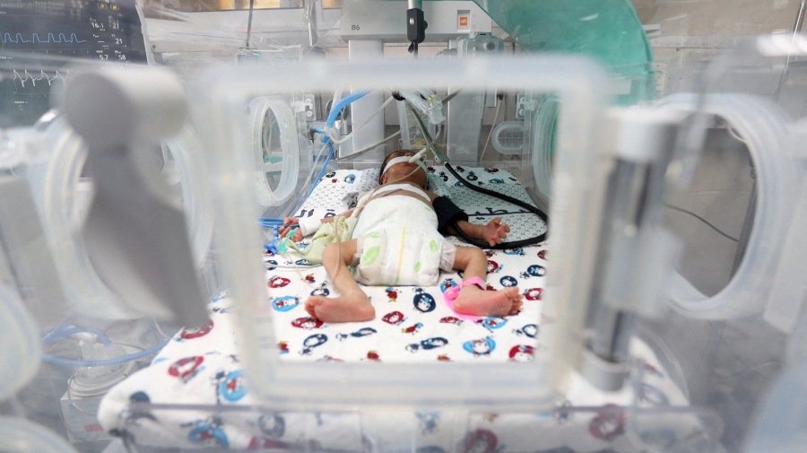 A premature Palestinian baby lies in an incubator at the maternity ward of Shifa Hospital- Reuters pic