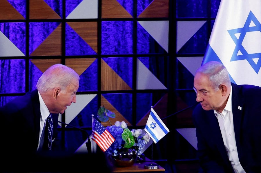 U.S. President Joe Biden attends a meeting with Israeli Prime Minister Benjamin Netanyahu, as he visits Israel amid the ongoing conflict between Israel and Hamas, in Tel Aviv, Israel, October 18, 2023. REUTERS PIC