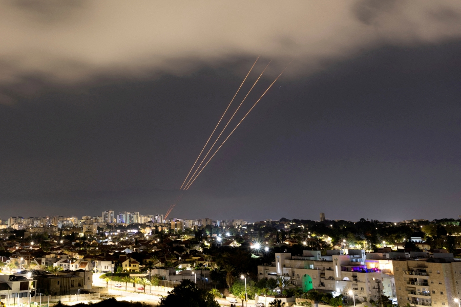 (FILE PHOTO) An anti-missile system operates after Iran launched drones and missiles towards Israel, as seen from Ashkelon, Israel. (REUTERS/Amir Cohen)