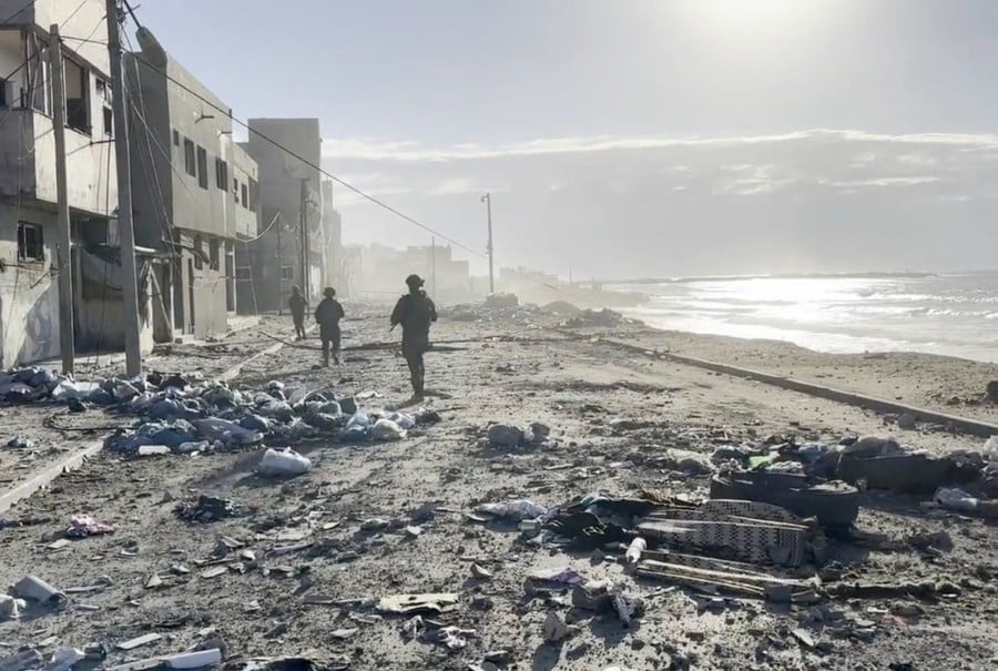Israeli soldiers operate, amid the ongoing ground operation of the Israeli army against Palestinian Islamist group Hamas, in a location given as Gaza Strip in this screengrab obtained from a video released on November 17, 2023. REUTERS FILE PIC