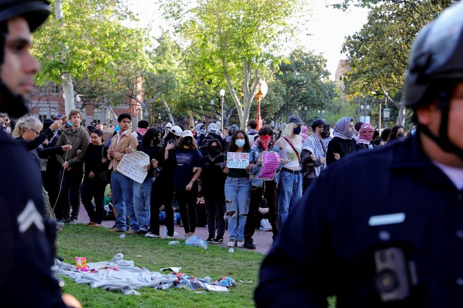 LAPD surrounds students protesting in support of Palestinians at an encampment at the University of Southern California’s Alumni Park, as the conflict between Israel and the Palestinian Islamist group Hamas continues, in Los Angeles, California, U.S., April 24, 2024. REUTERS PIC