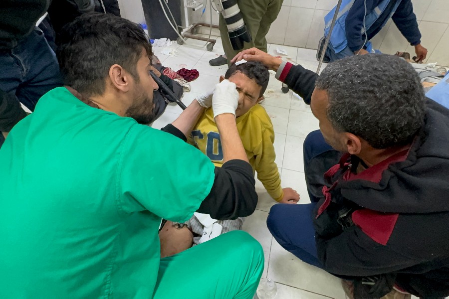 A Palestinian child who was wounded in an Israeli strike receives treatment, amid the ongoing conflict between Israel and the Palestinian Islamist group Hamas. REUTERS PIC