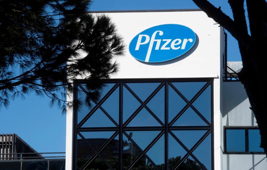 A logo is seen on Pfizer's headquarters in Labaro, Rome, Italy, 18 November 2020. Pfizer and BioNTech said they you are planning to submit their Covid-19 vaccine for US and EU emergency approval 'within days'.  EPA/CLAUDIO PERI