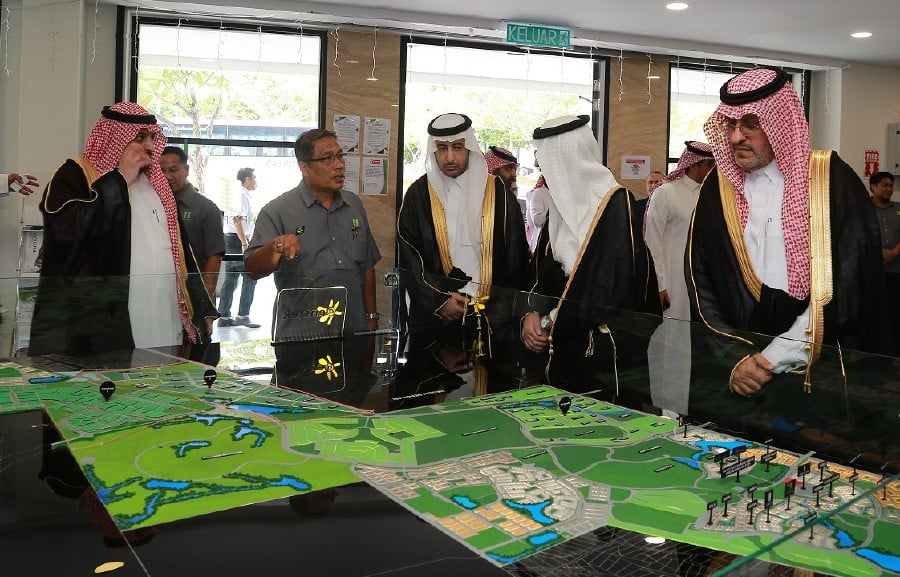 The Saudi delegation led by Dr. Hisham Al-Jadhey, chief executive officer of the Saudi Food and Drug Authority looking at a scale model of techpark@enstek. Image courtesy of TH Properties 