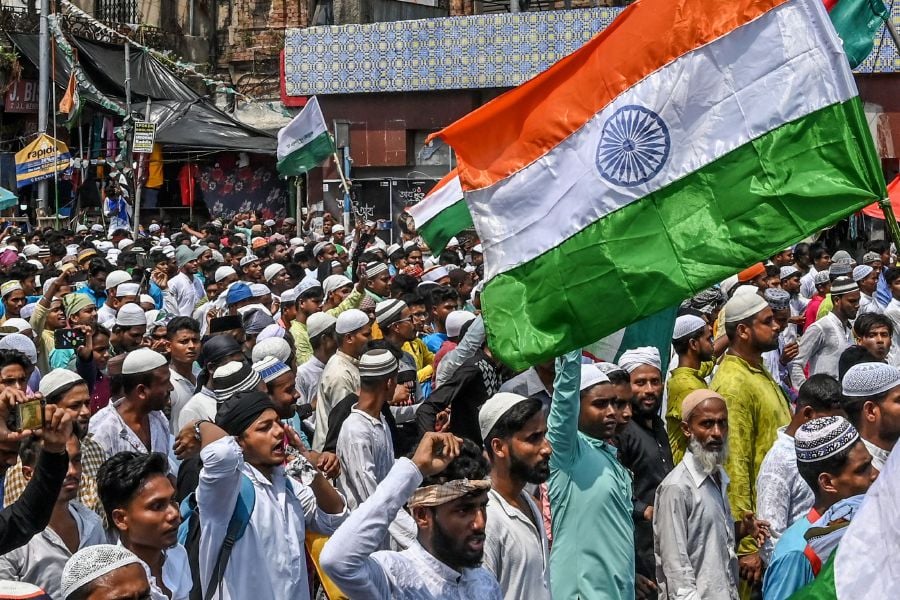 Muslim activists take part in a unity rally to promote communal harmony in Kolkata on June 14, 2022, following nationwide protests that erupted after remarks on Prophet by a former spokesperson from the ruling party. - AFP pic