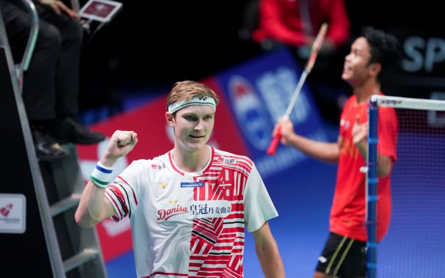 Denmarks Viktor Axelsen reacts after winning his match against Anthony Sinisuka Ginting of Indonesia during the Thomas Cup Badminton semifinals between Indonesia and Denmark in Aarhus, Denmark, 16 October 2021. - EPA pic