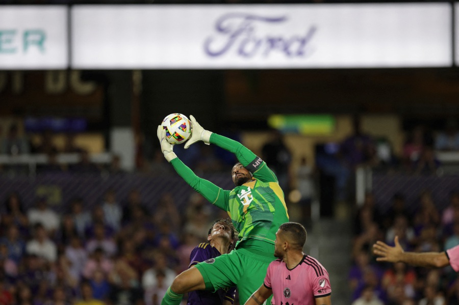 Inter Miami goalkeeper Drake Callender leaps for the ball in the second half against the Orlando City at Inter&Co Stadium. - Nathan Ray Seebeck-USA TODAY Sports