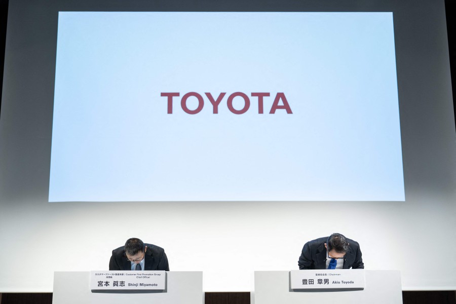 The transport ministry told the companies to stop delivering certain models within Japan after they reported failures to follow standardised steps to certify vehicles for shipment. -- AFP photo