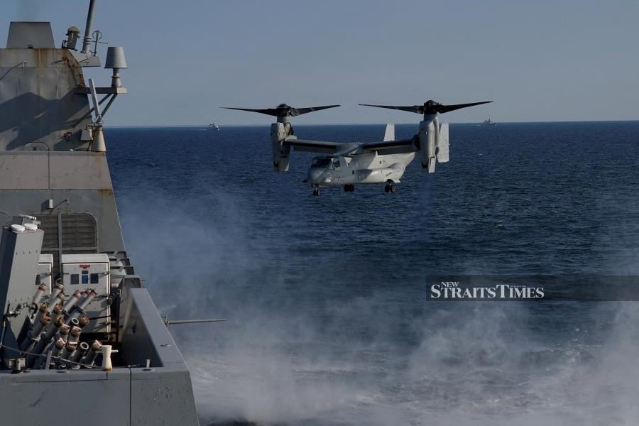(FILE PHOTO) A U.S. Bell Boeing V-22 Osprey helicopter lands on the USS Mesa Verde ship during the Northern Coasts 2023 exercise in the Baltic Sea. (REUTERS/Janis Laizans/File Photo)