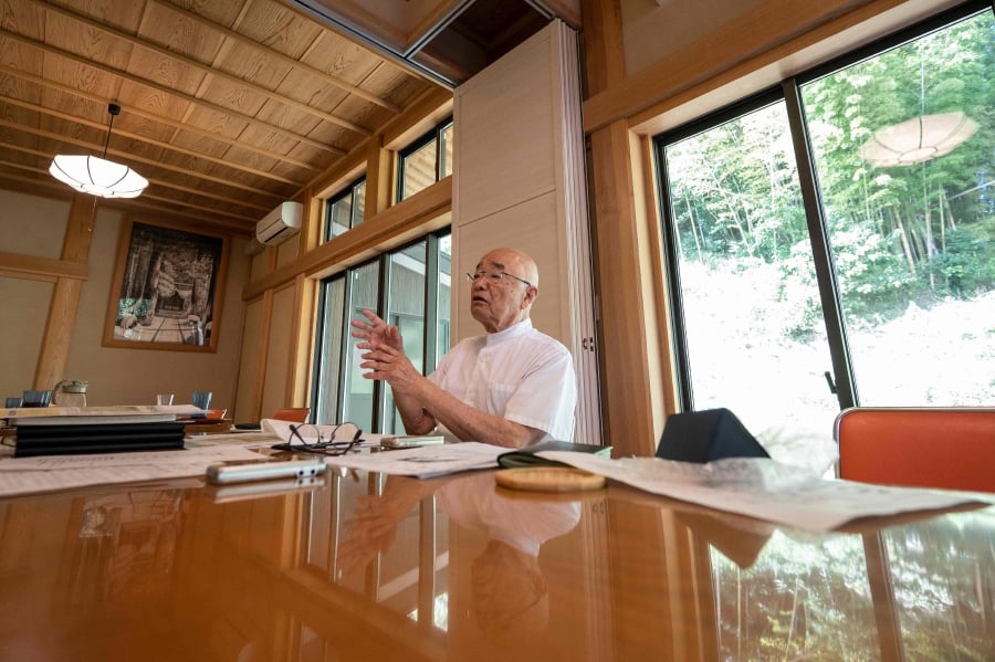 Chief Buddhist priest Eiichi Shinohara coordinates a network of about 50 fellow Buddhist monks who offer counselling to those who have fallen into deep despair, including after being scammed. (Photo by Richard A. Brooks / AFP) 