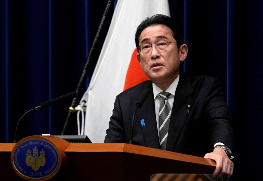 Japanese Prime Minister Fumio Kishida speaks during a news conference at the prime minister's office in Tokyo, Japan, 13 December 2023. Prime Minister Kishida said he will replace several ministers implicated in a political fundraising scandal. REUTERS PIC