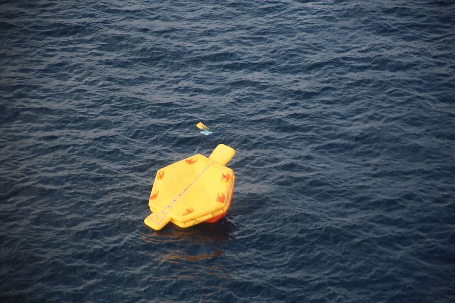 A rescue raft taken from an aircraft during the search and rescue operations after a US Osprey aircraft crashed at sea off the island of Yakushima. (Photo by Handout / Japan Coast Guard / AFP) 