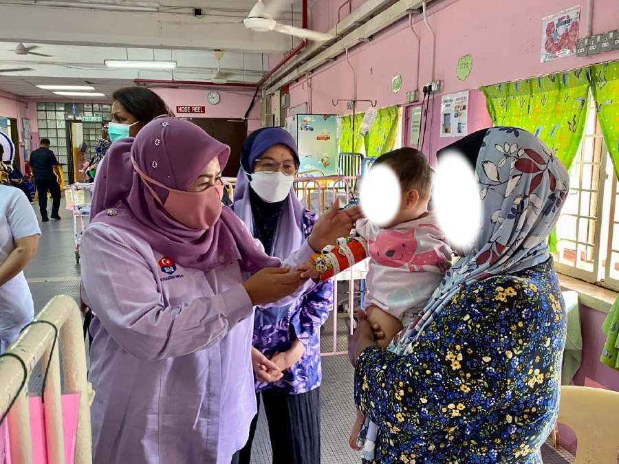 State Women, Family and Community Development Committee chairman Khairin-Nisa Ismail with the baby girl at the Sultanah Aminah Hospital.- Courtesy pic