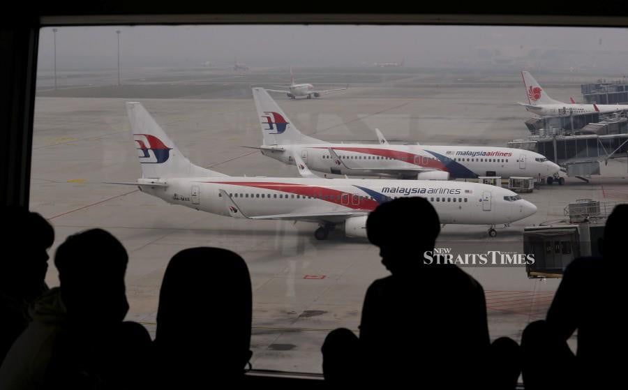 The report on the network systems disruption at the Kuala Lumpur International Airport (KLIA), which disrupted flights as well as passenger movements, is expected to be received next month. -- NSTP Archive