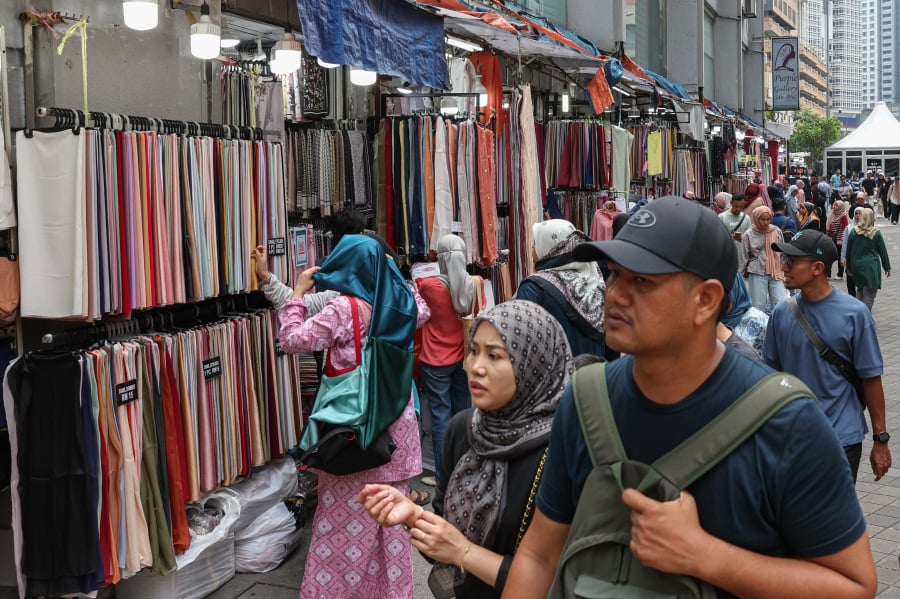 The past month has seen annual Ramadan bazaars, usually a financial bonanza for traders, experiencing a major crunch. - Bernama pic