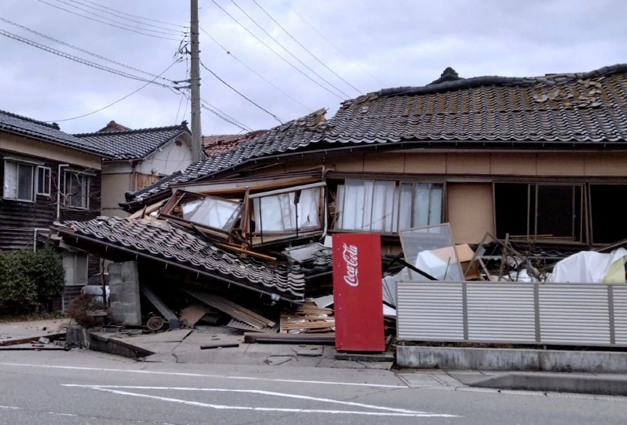 A collapsed house following an earthquake is seen in Wajima, Ishikawa prefecture, Japan, in this photo released by Kyodo. Pic credit Kyodo via REUTERS