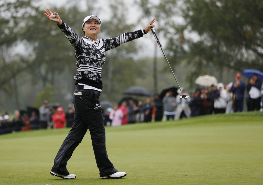 Ko Jin-young of South Korea reacts after sinking her final putt on the 18th hole to win the final round of the Cognizant Founders Cup at Mountain Ridge Country Club in West Caldwell, New Jersey. - AFP PIC