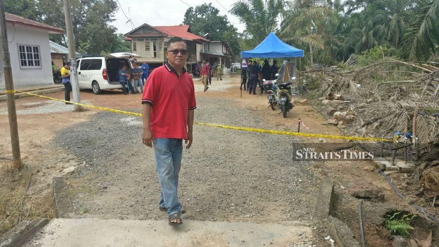 Factory supervisor Jinaidi Nasiran, 55 said he heard a loud noise and was startled to see the plane lose control before crashing, followed by a loud bang outside his house. - NSTP / FAIZ ANUAR