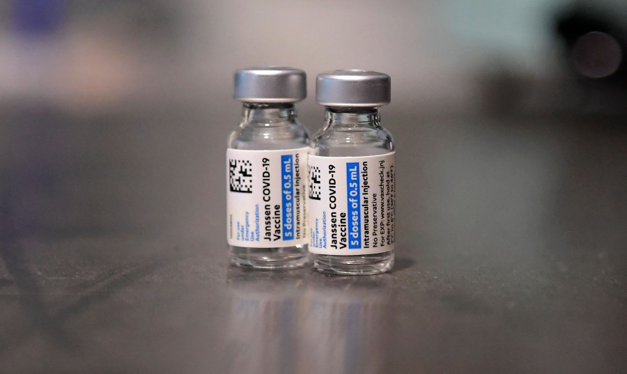 People who received Johnson & Johnson's Covid-19 vaccine may benefit from a booster dose of Pfizer or Moderna. - AFP PIC