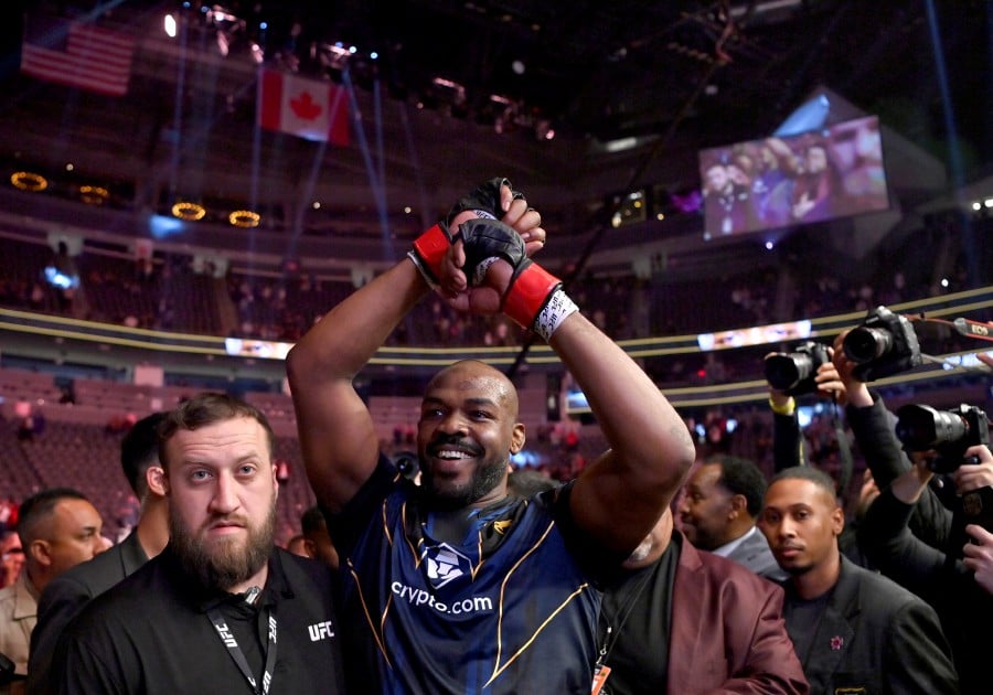Jon Jones celebrates his victory over Ciryl Gane as he walks from the octagon after the UFC 285 mixed martial arts heavyweight title bout in Las Vegas. - AP PIC