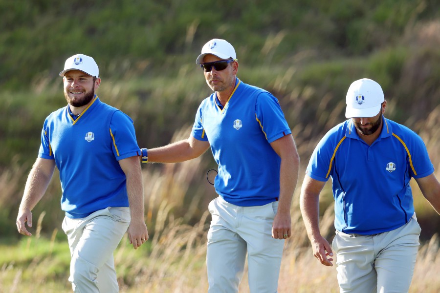  (L-R) Tyrrell Hatton of England, vice-captain Henrik Stenson of Sweden, and Jon Rahm of Spain and team Europe walk across the 15th hole during Friday Afternoon Fourball Matches of the 43rd Ryder Cup at Whistling Straits on September 24, 2021 in Kohler, Wisconsin. - AFP PIC