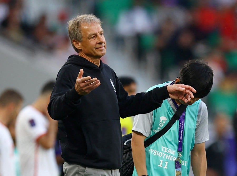 Jurgen Klinsmann praised his players' response after South Korea avoided a major Asian Cup upset by the skin of their teeth in a 2-2 draw with Jordan yesterday. - Reuters pic