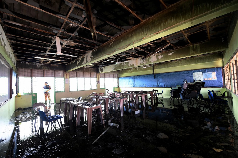 A fire broke out at SMK St Michael, one of the oldest schools in Alor Star, at noon today, damaging two classrooms and an auditorium. -- Bernama photo
