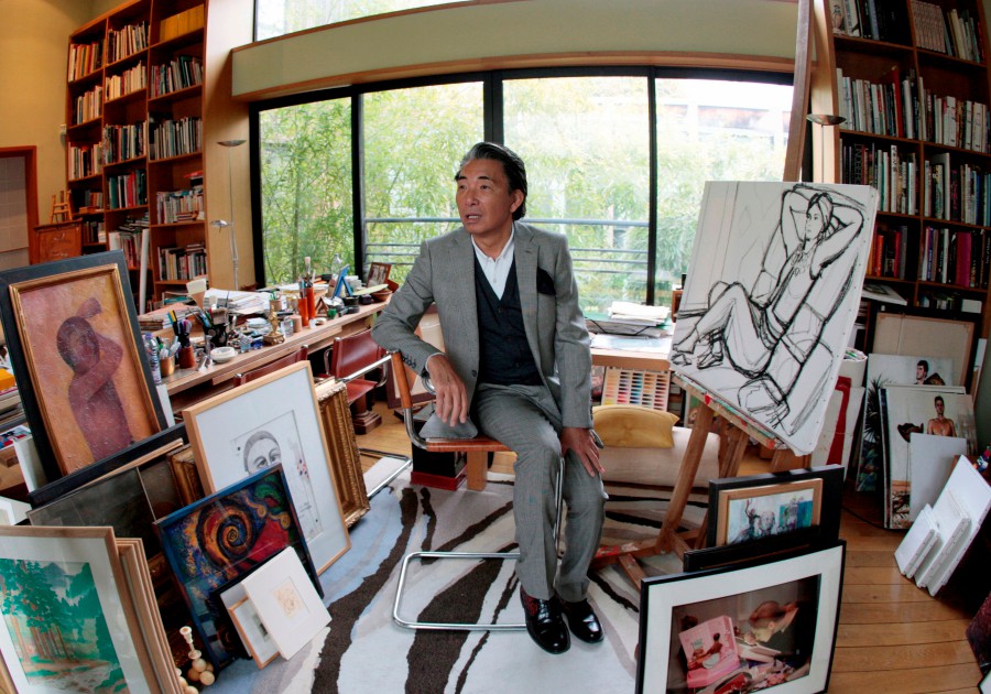 (FILES) This file photo taken on March 24, 2009 shows Paris-based Japanese designer Kenzo Takada, aka "Kenzo", posing in the workshop of his 1.362 m2 loft in Paris. - Japanese designer Kenzo Takada has died at the age of 81, from the novel coronavirus, Covid-19, his spokesperson announced in Paris on October 4, 2020. Takada was the founder of the French luxury fashion house Kenzo, founded in 1970 and owned by parent company LVMH. (Photo by FRANCOIS GUILLOT / AFP)