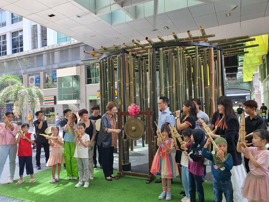 Sabah Tourism, Culture and Environment minister Datuk Christina Liew launches the Market Below The Wind-Bamboo Forest Within Cityscape Installation event at KK Times Square here yesterday. - Photos courtesy of KEPKAS