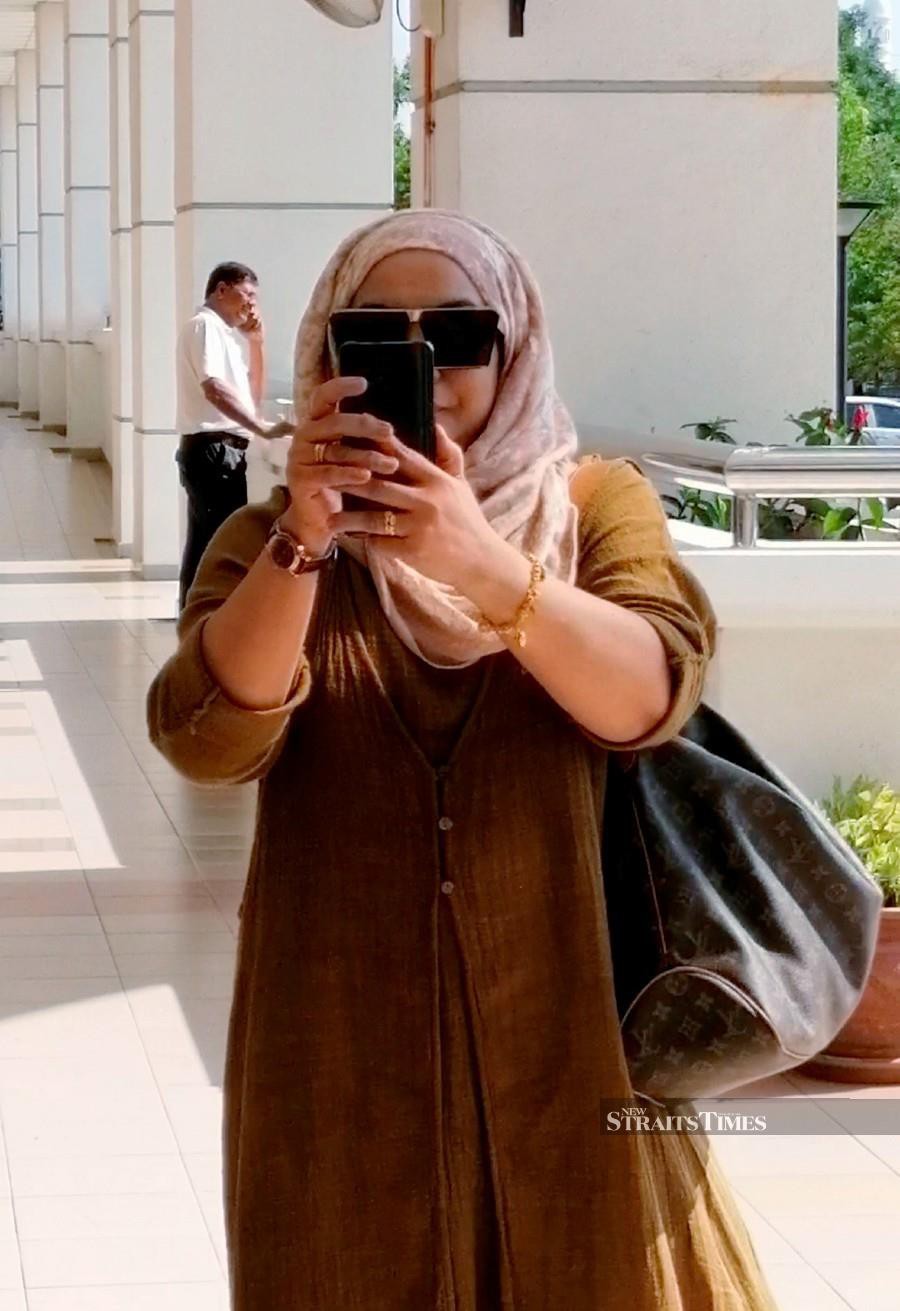 A mother and daughter, who had previously pleaded guilty to 11 counts of illegally receiving more than RM44,000 in deposits, changed their plea today at the Sessions Court. -- NSTP/IQMAL HAQIM ROSMAN.