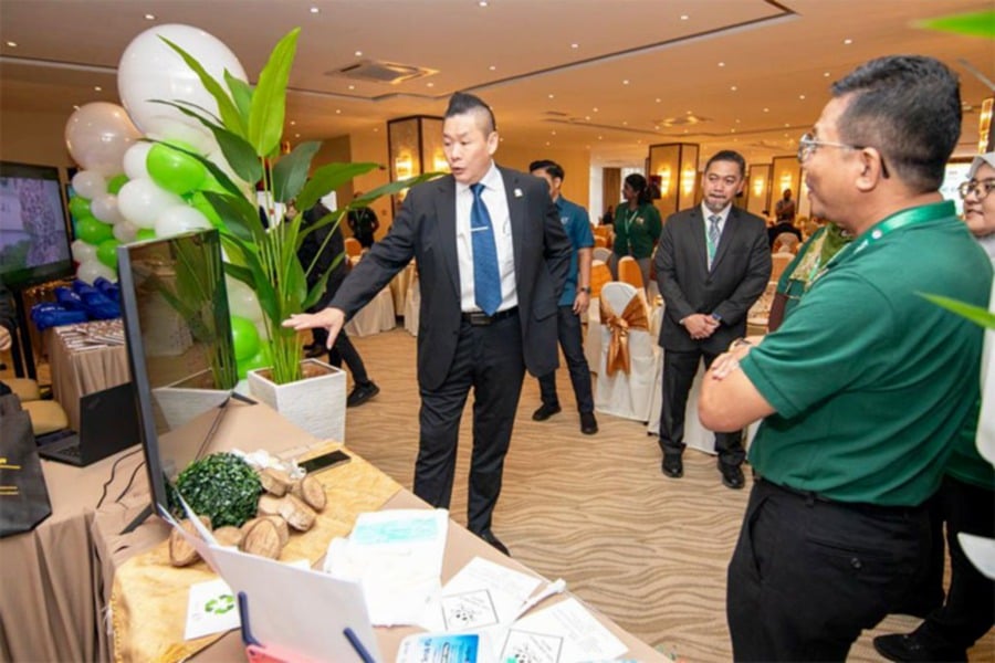 KPJ Healthcare Bhd president and managing director Chin Keat Chyuan explaining the segregation of medical waste by KPJ Ampang Puteri Specialist Hospital.