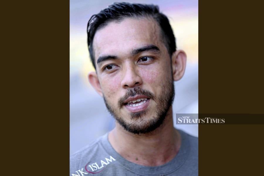 Kelantan player Khairul Helmi Johari has denied the claim by club owner Norizam Tukiman that all the players in the team received RM1,000 each for salary owing. - NSTP file pic