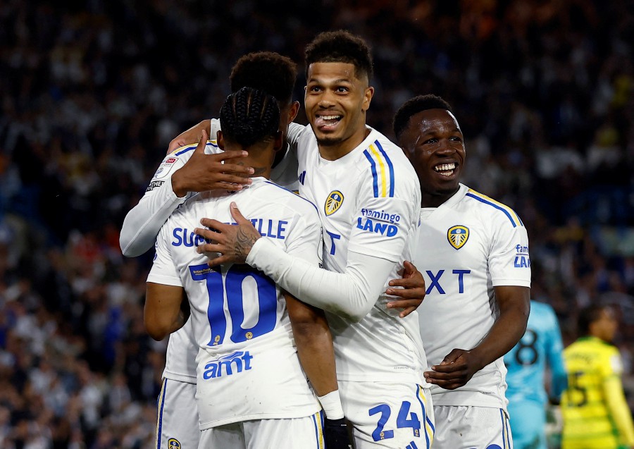 Championship - Play-Off Semi Final - Second Leg - Leeds United v Norwich City - Elland Road, Leeds, Britain - May 16, 2024Leeds United's Crysencio Summerville celebrates scoring their fourth goal with Georginio Rutter and teammates. - Reuters pic..