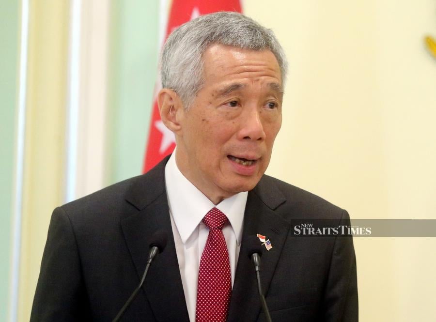 Singapore PM announces cabinet reshuffle, Swee Keat remains as DPM ...