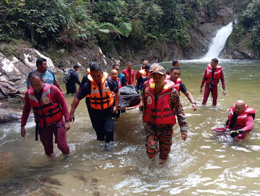 The remains of Muhamad Hafiz Khairul Azmi, who went missing at the Lata Hammer waterfall in Bentong, was found today. - Pic courtesy of Fire and Rescue Dept