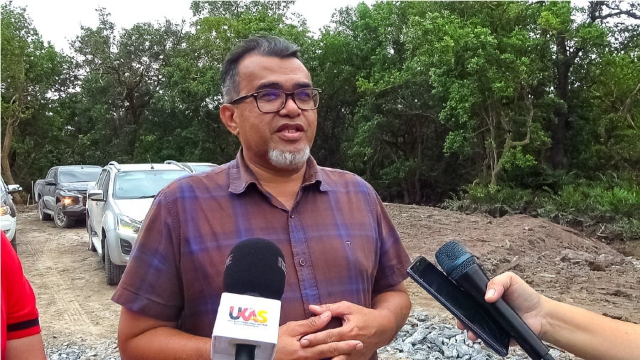 Deputy Transport Minister Datuk Hasbi Habibollah speaking to the media at the NRDA Road Projects site in Limbang. - File pic credit (UKAS)